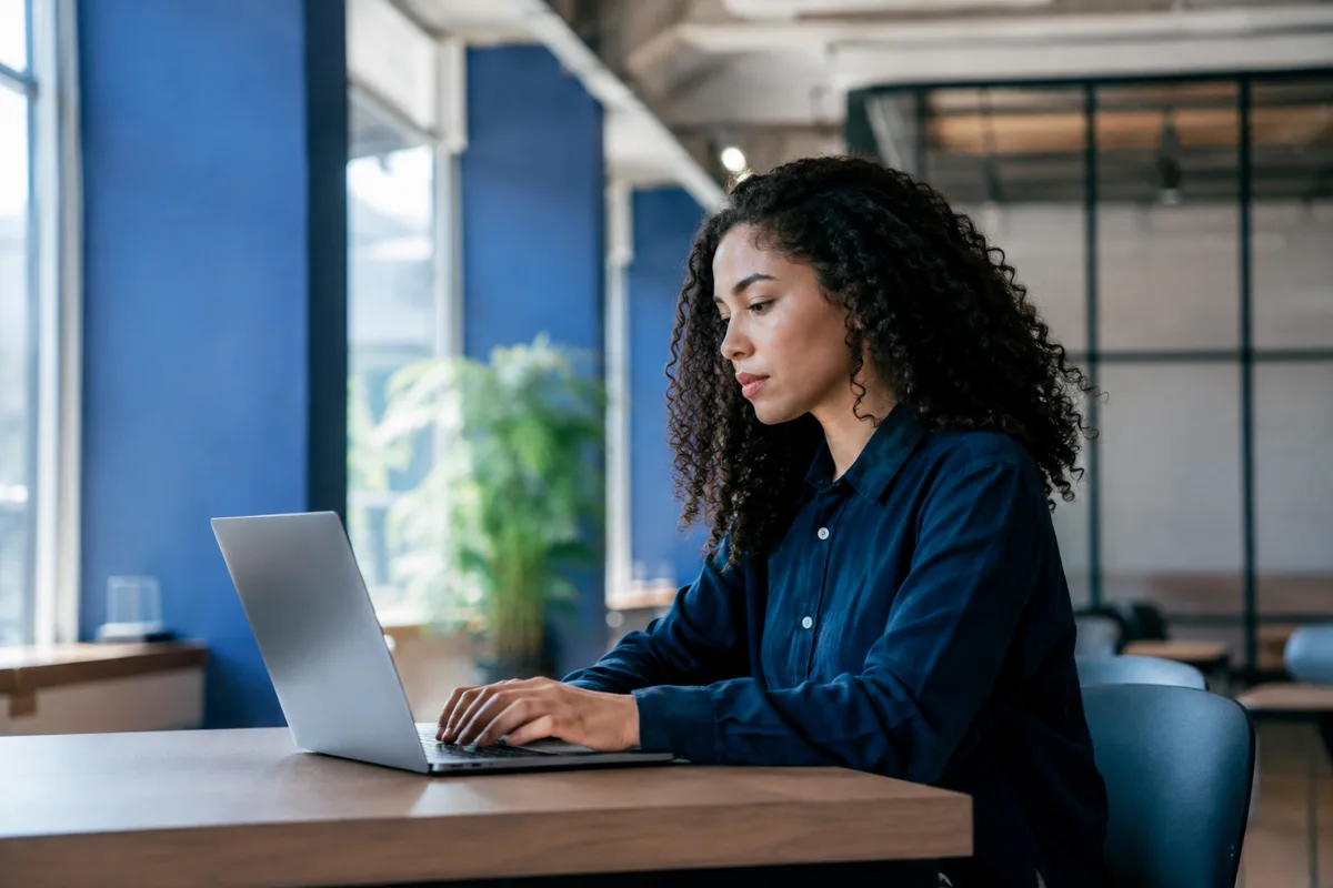 A professional exploring career opportunities on a laptop